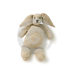 Old toy rabbit knitted isolated