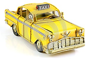 Old toy yellow taxi