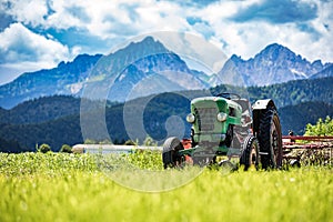 Old tractor in the Alpine meadows