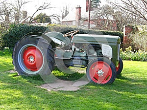 Old Tractor in Green Field