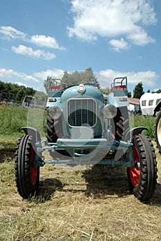 Old tractor in the meadow