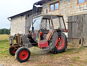 Old tractor and a plow