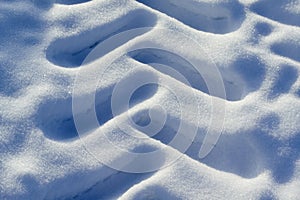 Old tractor tyre marks in snow