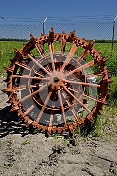 Old tractor wheel with lugs