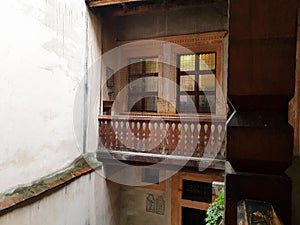 Old traditional balcony of the italian. Vintage Style. Italian courtyard