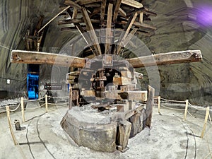 Old traditional extraction machine in a salt mine gallery in Turda,Romania