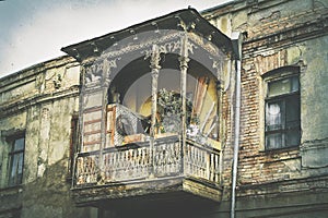 Old traditional Georgian style architecture wooden balcony with carved decorations in old town Tbilisi