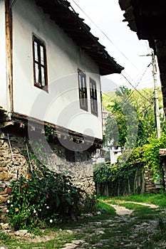 Old traditional house bulgarian house with wooden windows and stone wall in a small village, Lovech