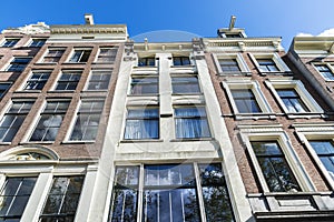 Old traditional leaning houses in Amsterdam, Netherlands