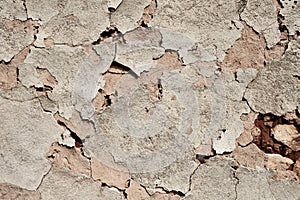 Old traditional limewashed plaster stone wall