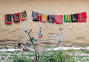 Old traditional pots and colorful scarves at a country fair in Salaj, Transylvania, Romania