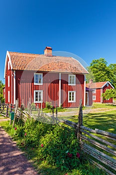 Old traditional red wooden Swedisch house