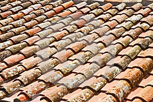 Old traditional tuscany terracotta roof with copper gutter Tuscan - Italy