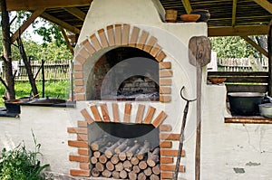 Old traditional ukrainian brick oven stove with open fire