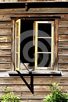 Old traditional village log house window, Russia