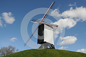 Old traditional windmill in Bruges, Belgium
