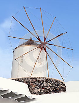 Old traditional windmill in Oia village on Santorini Island, Cyclades, Greece