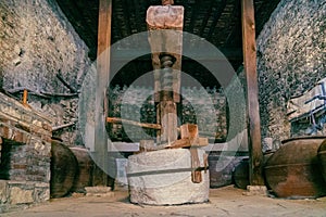 Old traditional wine press in mountain village Omodos on Cyprus