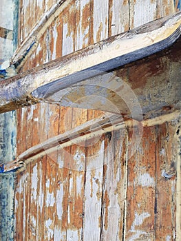 Old traditional wood texture from the French West Indies. Rowing boat wooden structure background. Old wooden ship planks. F.W.I