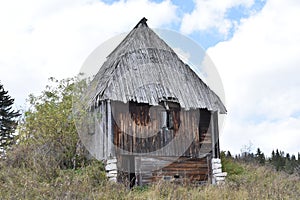 The old,traditional,wooden,abandoned house in the village Podgora