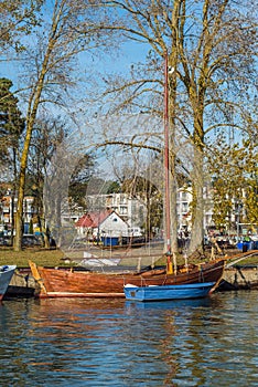 Old traditional wooden fishboat in harbor