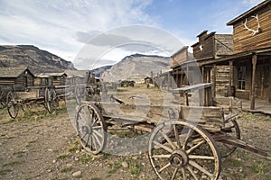 Old Trail Town western wooden wagon wheel mountains Wyoming ghost photo