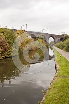 Old train bridge made of red bricks masonry