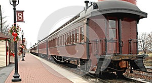 Old train cars at train station photo