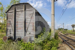 Old cargo train cart abandoned on a disused train line