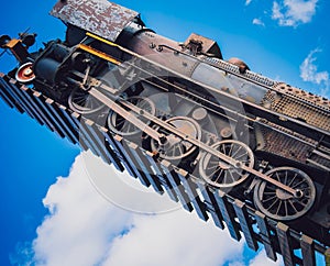 Old train high up in the sky and surfing through the clouds.