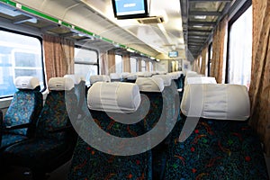 Old train interior with empty seats