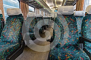 Old train interior with empty seats