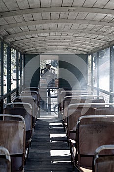 Old train interior with empty seats