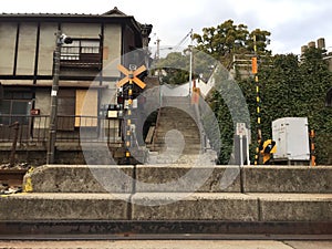 Old train intersection with old building, Onomichi, Hiroshima, Japan