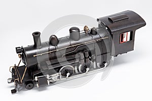Old train machine tin toy isolated