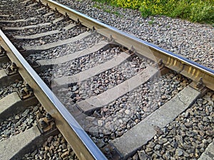 Old train rails in landscape in the summer season