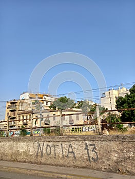Old train station in Larissis Athens Greece Metaxourgeio with letters on old wall urban decay