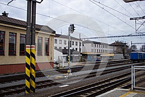 Old train station, rails wires, peron, concrete. Czech Republic