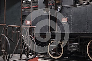 Old train station with Vintage black steam locomotive