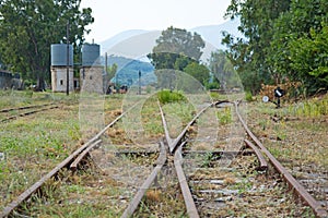 Old train tracks at an old railway station, Greece.