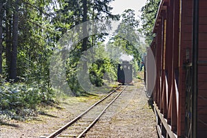 Old train and train museum in Ohs, Sweden photo