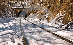 Old train tunnel in snow