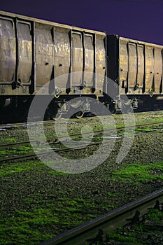 Old train wagons by night