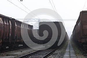 Old train wagons parked in a train station