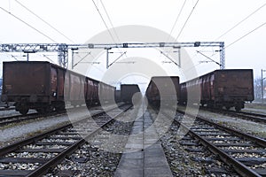 Old train wagons parked in a train station