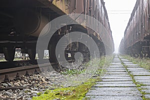 Old train wagons parked in a train station