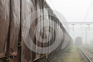 Old train wagons parked in a train station