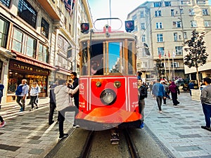 Old tram Istiklal Avenue in Istanbul, Turkey November 2, 2019. Nostalgic Red Tram in Taksim Istiklal Street. Red Retro tram on