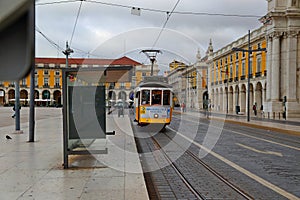 Old tram in the Praca do Comercio Commerce Square in Lisbon