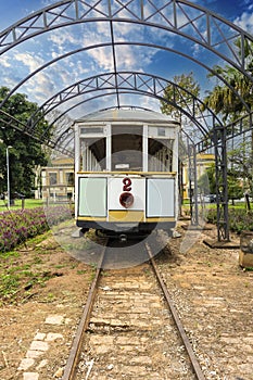 Old tram stopped on the tracks in a city in Brazil